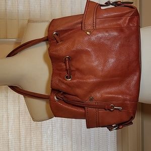 Beautiful vintage red pebbled leather Fossil satchel bag.
